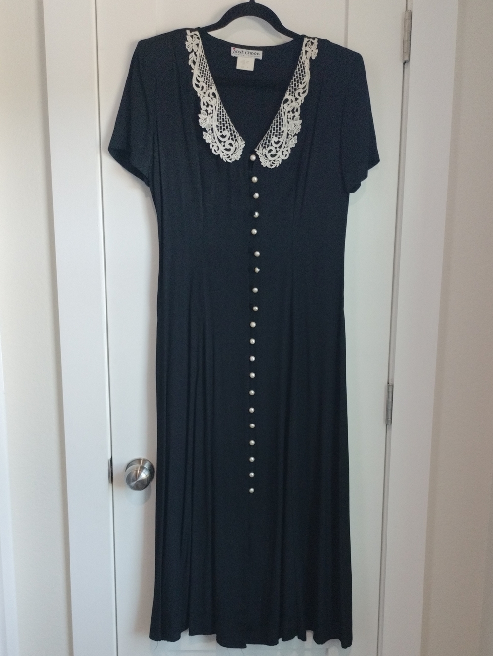 Black Dress with Lace Collar and Pearl Buttons